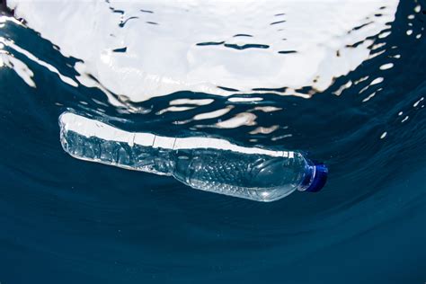 Plastic Bottle Floating In Ocean Recycling Magazine