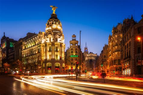 Gran Via And The Metropolis Building In The Heart Of Madrid Spain