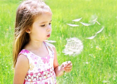Beautiful Little Girl Blowing Dandelion Stock Image Image Of Adorable