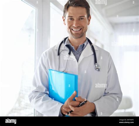 Healthcare you can trust. Portrait of a handsome male doctor standing