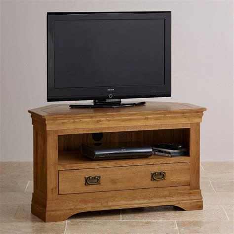 This tv stand is made of solid mango wood featuring a trendy yet practical design, this wooden tv cabinet will definitely become a focal point of your room. 15 Best Real Wood Corner Tv Stands