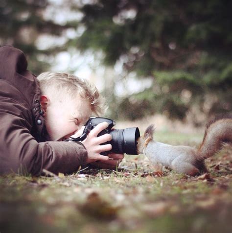 Photographer Captures Enchanting Snapshots Of Himself Feeding Wild Animals