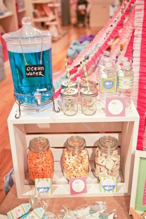 Sand cake, beach towel mermaid tails, starfish sandwiches, seahorse cookies, the sea foam cotton candy, & more! 20 food & decor ideas for a beach-themed party - JewelPie