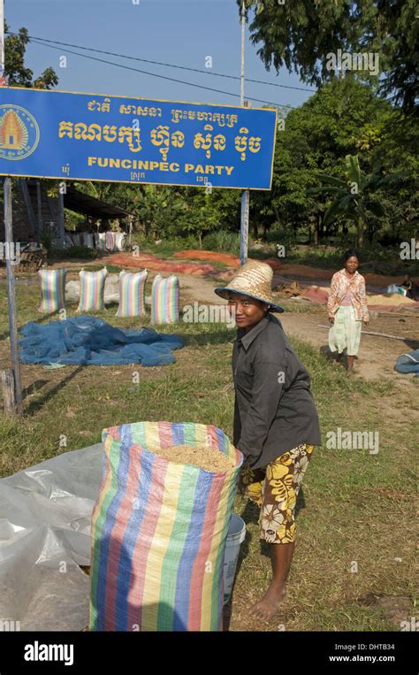 Farmer With A Bulging Rice Bag Cambodia Stock Photo Alamy