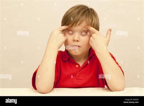 Young Boy Making Faces Stock Photo Alamy