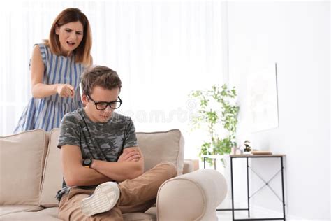 Mother Scolding Her Teenager Son Stock Photo Image Of Frustrated