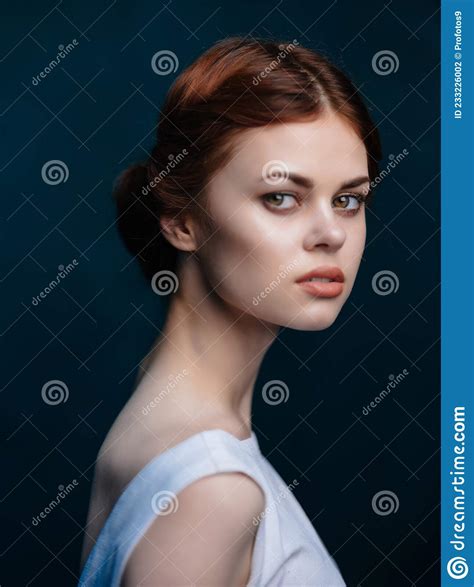 Red Haired Woman In White Dress Posing Attractive Studio Look Stock