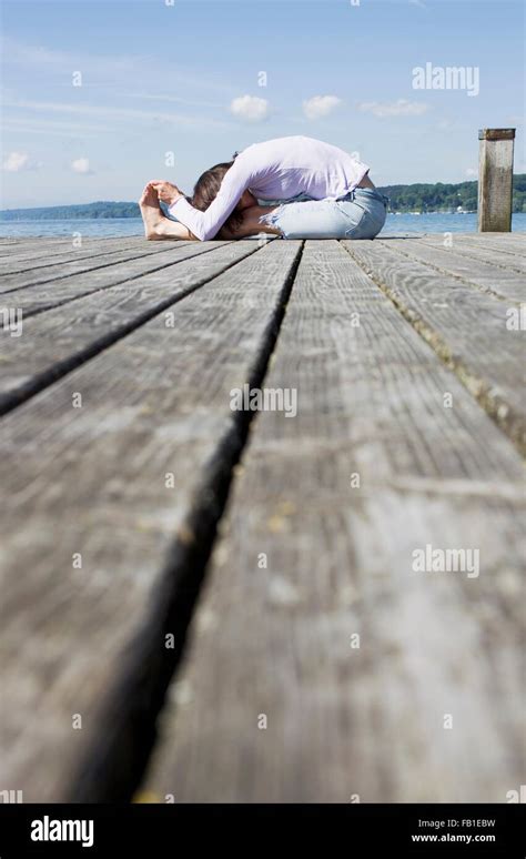 Woman Bending Over Touching Toes Hi Res Stock Photography And Images