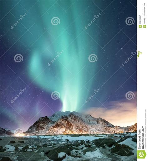 Northen Light Above Mountains On The Lofoten Islands Stock Image
