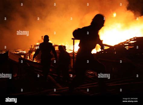 Firefighters put out a fire that ravages ancient Dukezong town in