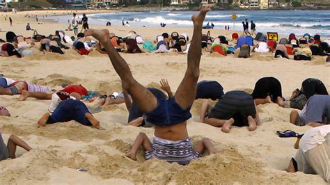 G20 Climate Change Protesters Bury Their Heads In The Sand