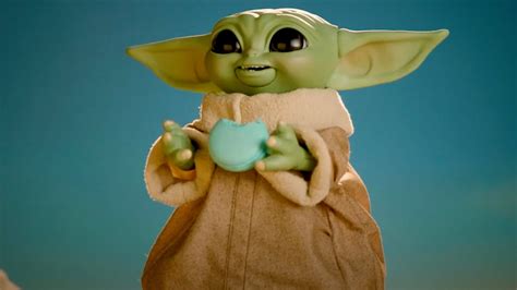 Heres A Cute New Baby Yoda Toy Called Galactic Snackin Grogu — Geektyrant