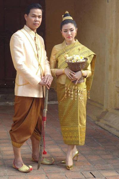 Lao Wedding Costume Groom Is Wearing Salong Pants While Bride Is Wearing Sinh Traditional
