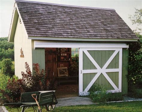 Cute Green Shed With Sliding Barn Style Door Barns Sheds Backyard Sheds