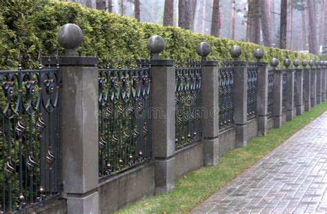 Iron Fence With Stone Pillars Stock Photo Image 36006430