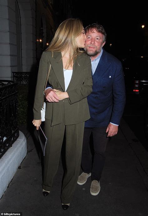 Jacqui Ainsley Plants A Kiss On Guy Ritchie As They Enjoy A Night Out