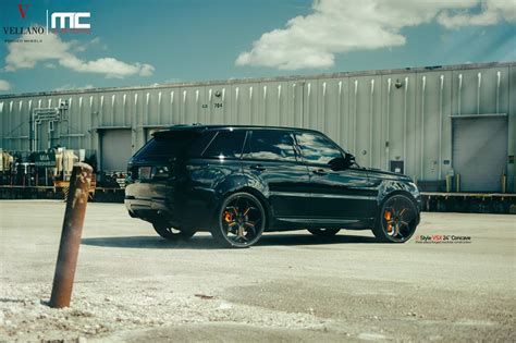 Delivering a more dynamic look, this pack pairs gloss black features with narvik black accents in elements including the front grille, bonnet and fender vents and mirror caps to give the vehicle an even greater presence. Blacked-Out Range Rover Sport by MC Customs
