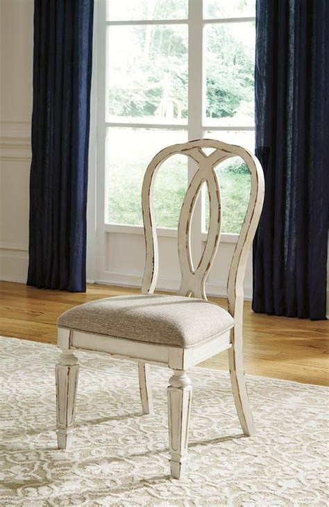 Realyn Chipped White Dining Upholstered Side Chair Includes 2