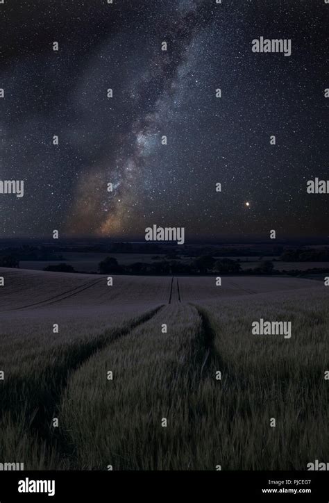 Stunning Vibrant Milky Way Composite Image Over Landscape Of Wheat