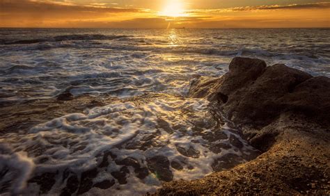 Ocean Waves Crashing On Shore During Sunset 1224446 Stock Photo At Vecteezy