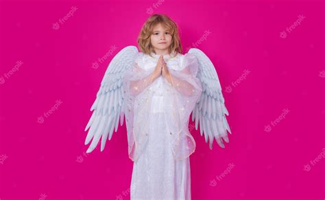 Premium Photo Angel Prayer Kid With Angel Wings With Prayer Hands