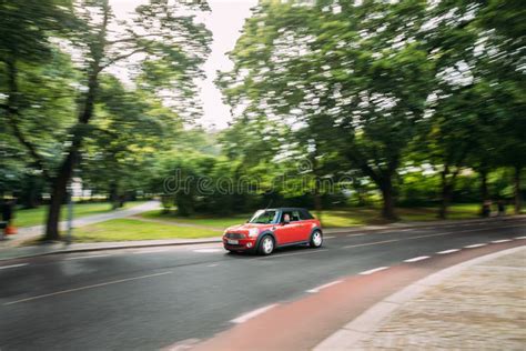 Red Mini Cooper Fast Driving In City Street Editorial Stock Photo