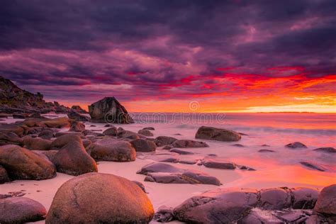 Dramatic Midnight Sunset With Amazing Colors Over Uttakleiv Beach On