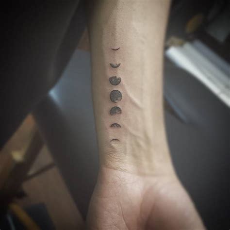 Small Moon Phases Tattoo On The Wrist