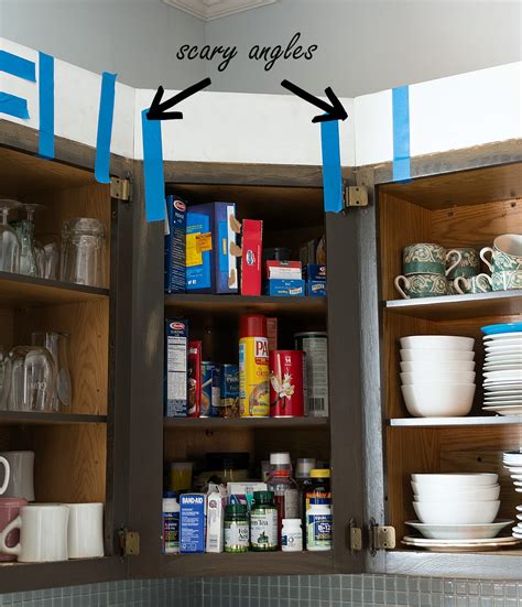 Painted upper cabinets and extended to ceiling height. How To Add Height To Kitchen Cabinets