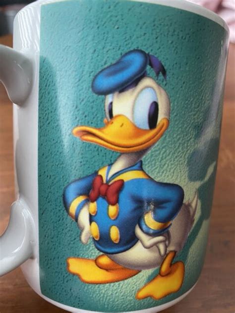 Donald Duck Shadows Goofy Coffee Cup Mug Disney Green High Five Vintage