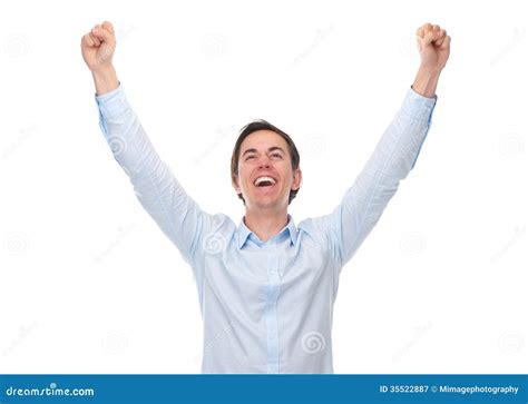 Close Up Portrait Of A Young Man With Arms Raised In Celebration