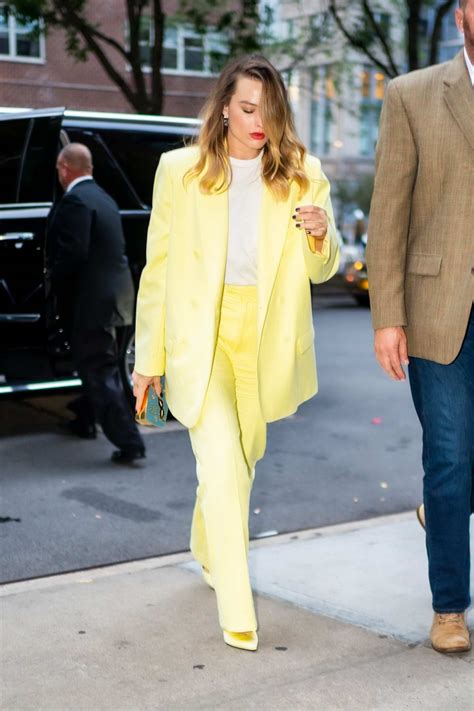Margot Robbie Stuns In A Bright Yellow Suit As She Steps
