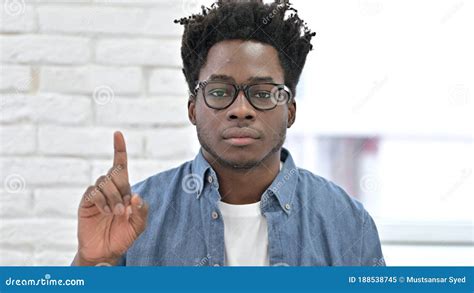 Young African Man Saying No With Finger Sign Stock Image Image Of