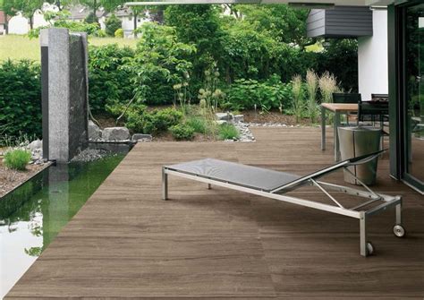 Treating wood helps it to resist rot and warping, and can prolong the lifespan of your outdoor flooring over time. wood look porcelain patio - Google Search | Luxury outdoor ...