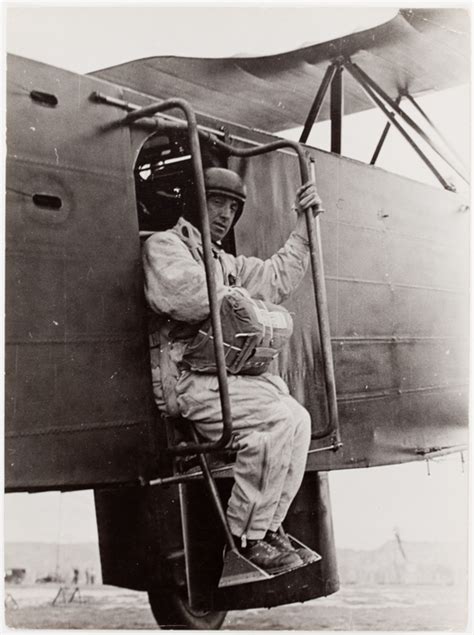 French Air Force Parachute Parachutist Sitting On The Stairs Of A