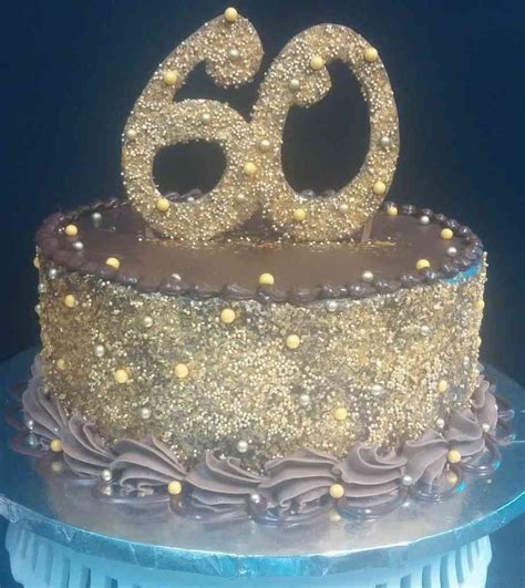 Made by the village bake shoppe. Gold 60th Birthday cake - le' Bakery Sensual