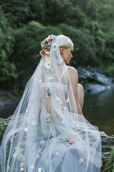 I am guessing that your veil is a longer, more traditional veil vs the birdcage. Gold Wedding Dress and Boudoir Shoot with Veil Covered in ...