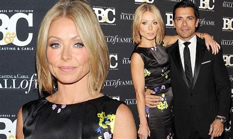 Kelly Ripa Is Radiant In A Black Satin Printed Gown As She Attends