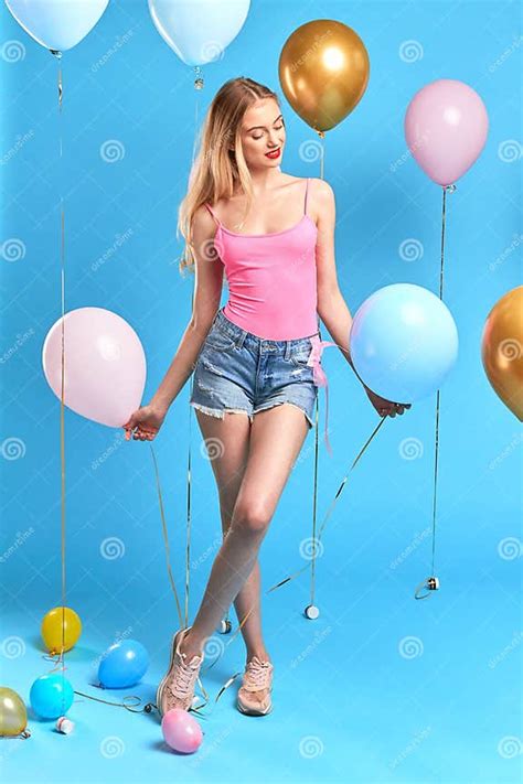 Romantic Awesome Blonde Girl Standing With Crossed Legs Among Balloons Stock Image Image Of