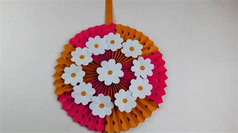 Just with a few steps, you can create these lovely flowers. DIY Wall Hanging, Home Decoration Ideas, Paper Flower Wall Hanging, Handmade Craft Ideas, #BDIY