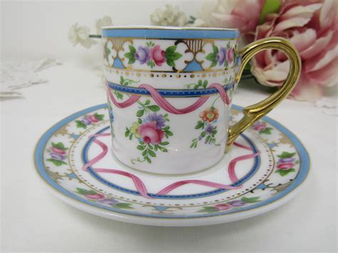 Pretty Demitasse Cup And Saucer From Crown Porcelain Ribbons And