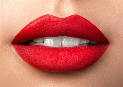 Close Up View Of Beautiful Woman Lips With Red Matt Lipstick Stock