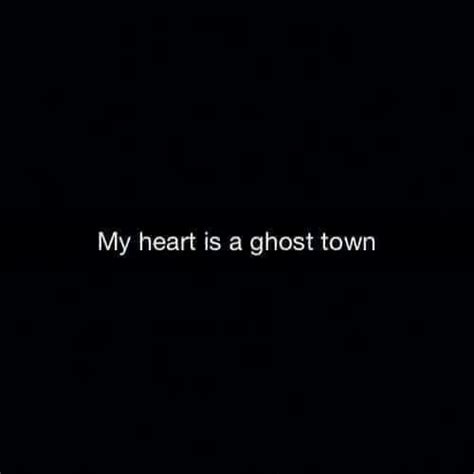 The Words My Heart Is A Ghost Town On A Black Background