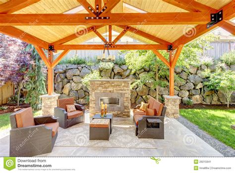 Protect your patio furniture with covers and care accessories for patio chairs, fire tables and more at canadian tire. Exterior Covered Patio With Fireplace And Furniture. Stock ...