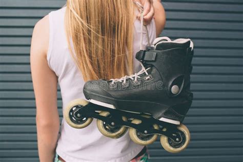 Pretty Blonde Girl Posing With Roller Skates Outdoors Summer Lifestyle