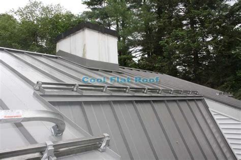 Standing seam metal roofs are also found on many shopping malls and industrial sites like power plants. standing-seam-metal-roof-with-snow-guards from New England ...