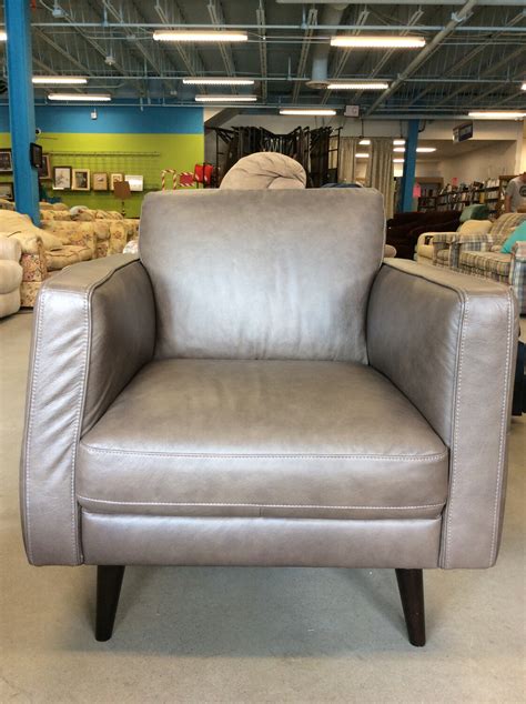 My costco only carried a white leather version of this chair. Natuzzi Editions Destrezza Leather Chair