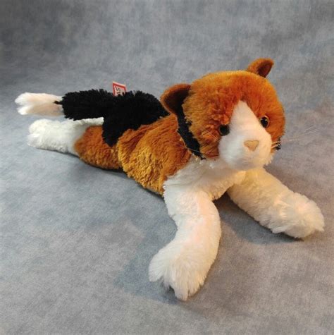 Cats come in a huge range of cat colours and patterns, which is controlled by genes, gene modifiers, gender and even temperature in pointed cats. DOUGLAS Cuddle Toy Plush Calico Cat Brown Black White 14 ...