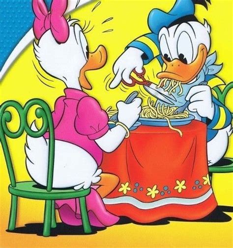 An Image Of Donald And Daisy Eating Spaghetti From The Table In Front