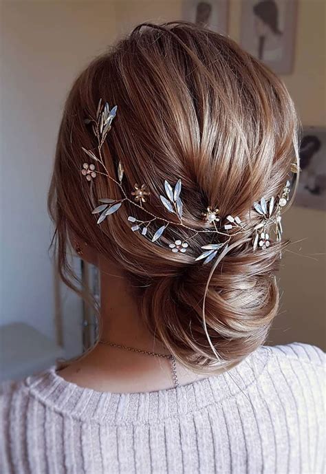 Keep your hair natural or straighten for this thick braided crown and a low bun. 100 Prettiest Wedding Hairstyles For Ceremony & Reception | Wedding hairstyles, High bun ...